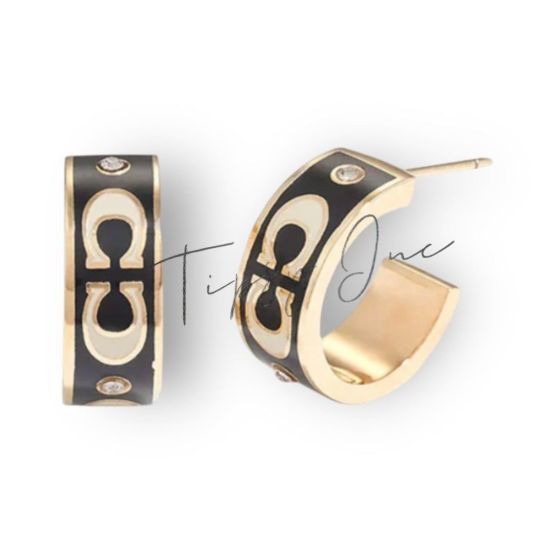 COACH Signature Black and Gold Enamel Huggie Earrings