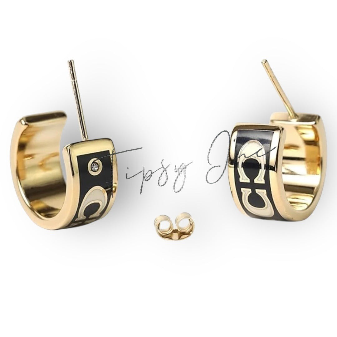 COACH Signature Black and Gold Enamel Huggie Earrings